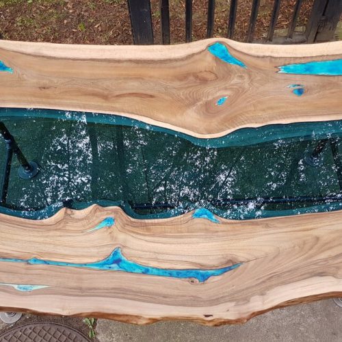 Industrial live edge river table with gas pipe legs and resin