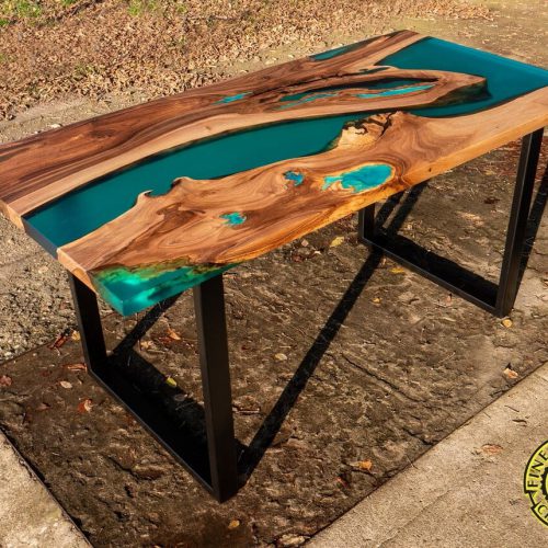 Turquoise resin dining table with glowing inlay
