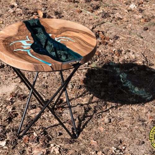 Round coffee table with crossed hairpin legs, river glass and glowing in the dark epoxy resine