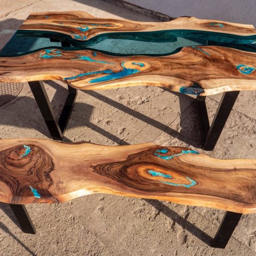 Live edge river glass dining table with bench and glowing resin fill in