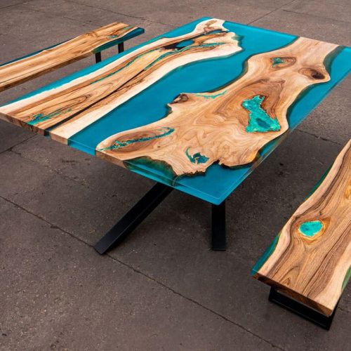 Dining table with resin river and two benches with glowing inlay