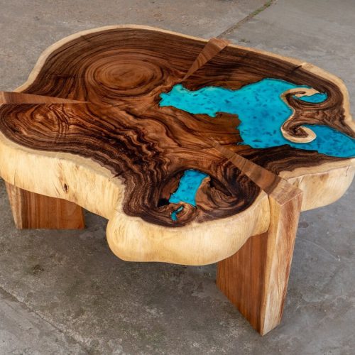 Resin Coffee table with glowing resin made of exotic suar wood