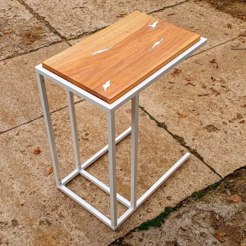 Bed side end resin table with white resin on metal C shaped legs, oak wood